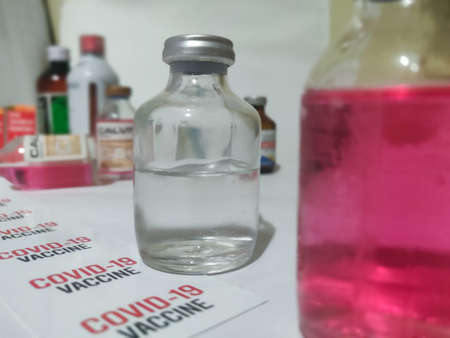 Development and creation of a coronavirus vaccine COVID-19 .Coronavirus Vaccine concept in hand of...