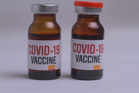 Development and creation of a coronavirus vaccine COVID-19 .Coronavirus Vaccine concept in hand of...