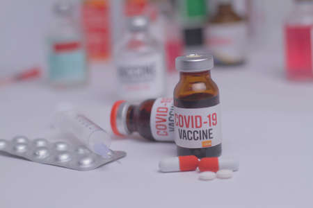 Development and creation of a coronavirus vaccine COVID-19 .Coronavirus Vaccine concept in hand of...