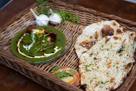 Dal makhani is a popular food from India made with garlic naan