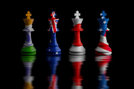 Image of a chess king with Japanese flag defeating white chess pieces. on black background.の写真素材