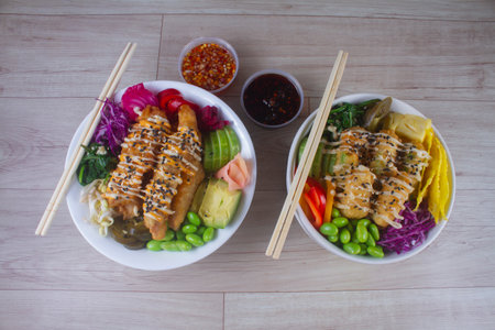 Crispy Tofu And Avocado and Poke chicken karage poke top view. japanese food.の写真素材