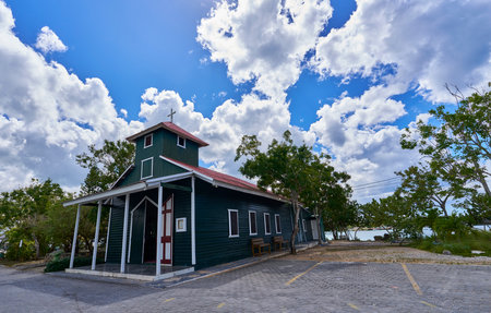 Colorful wooden church under the tropical sun of Bayahibeの写真素材
