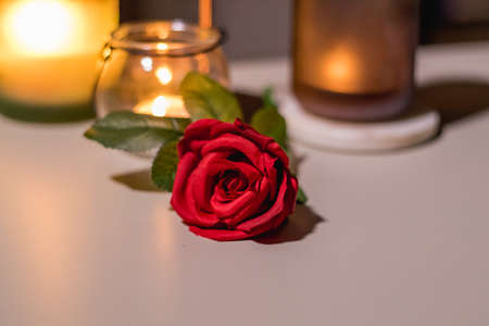red rose on table candle romanticの写真素材