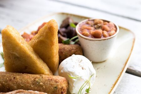 Cooked breakfast food sausages beans toastの写真素材