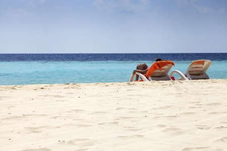 Tanning on the beachの写真素材