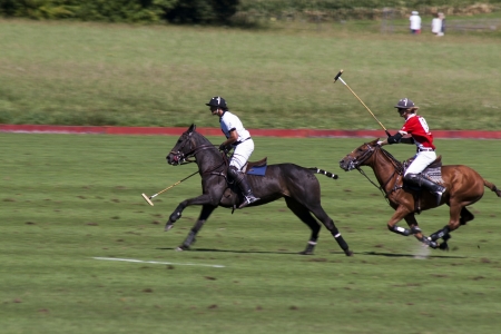Mies, Switzerland - August 28, 2011 - Polo players chasing ball during a Jaeger-LeCoultre Polo Masters match.のeditorial素材