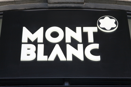Geneva, Switzerland, April 4, 2011 - Montblanc logo on a store sign. Montblanc is the maker of high quality writing pens.  Today the Montblanc brand is on other goods besides pens, including watches, jewel, fragrance, leather goods and eye-wear.のeditorial素材