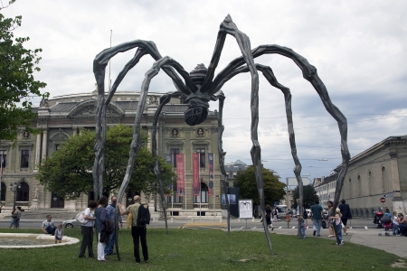 Geneva, Switzerland, August 2011 - Maman visits Geneva. Maman is a sculpture by the artist Louise Bourgeois. The sculpture, resembling a spider, is over 30ft high and over 33ft wide, with a sac containing 26 marble eggs.のeditorial素材