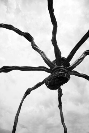 Geneva, Switzerland, August 2011 - Maman visits Geneva. Maman is a sculpture by the artist Louise Bourgeois. The sculpture, resembling a spider, is over 30ft high and over 33ft wide, with a sac containing 26 marble eggs.のeditorial素材