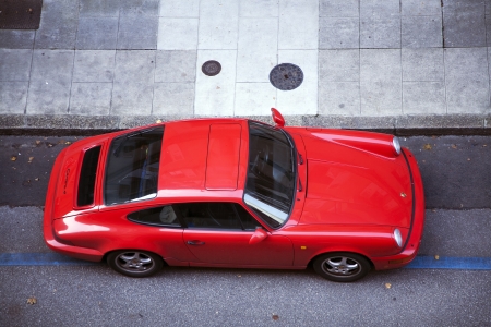 Geneva, Switzerland, November, 06, 2011 - Porsche Carrera 4 parked in a street in Geneva,...