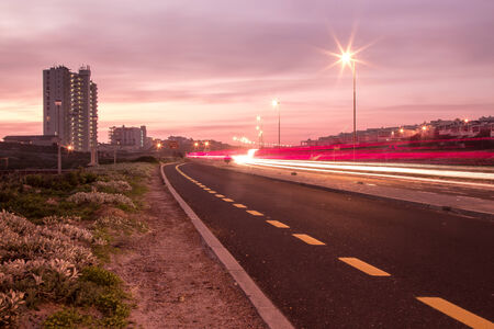 Sunset over roadの写真素材