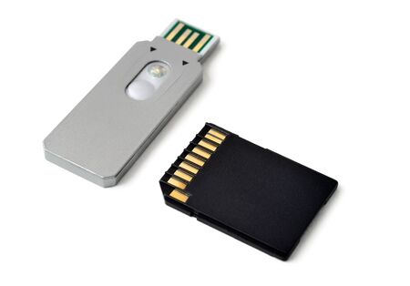 isolated flash drive and microsd on white background