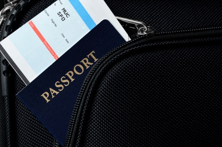 pasport and bording pass in a suitcaseの写真素材