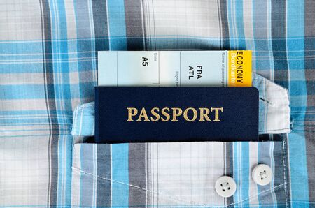 passport and boarding pass in a pocketの写真素材