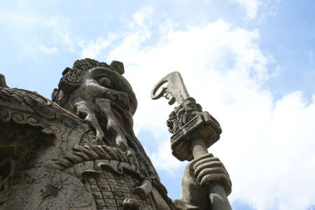 The stone Chinese doll standing and watching around.の写真素材