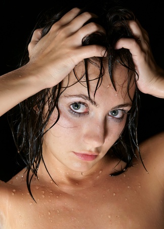The beautiful girl in a showerの写真素材