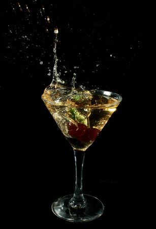 Cherry in a glass with champagne                 の写真素材