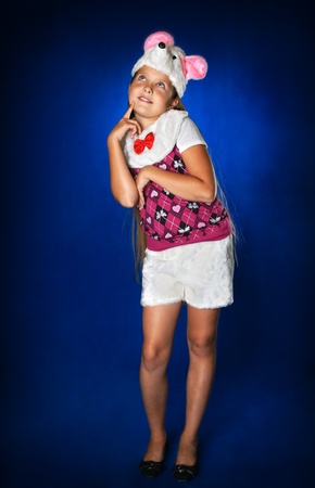 The little girl in a mouse suitの写真素材