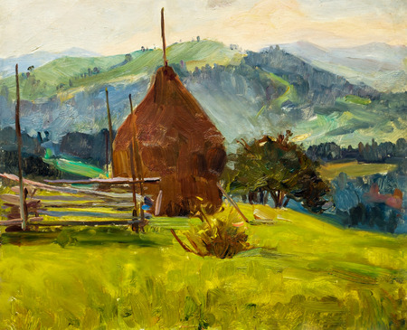 Beautiful Original Oil Painting of autumn landscape, haystack behind a fence on a background of green grass mountain range On Canvasの写真素材