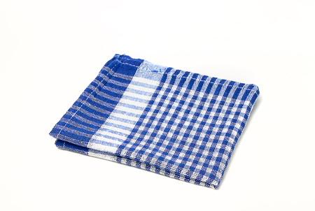 Blue checkered picnic clothes isolated.Decorative cotton napkin.Plaid gingham towel.の写真素材