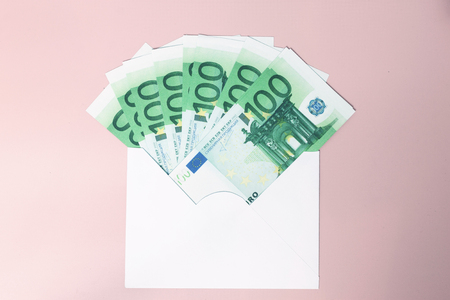 Piggy bank money on pink background. Savings conceptの写真素材