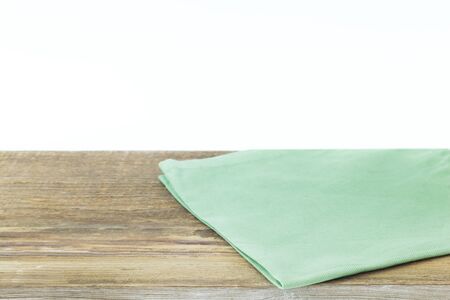 Napkin or tablecloth on wooden table. Copy spaceの写真素材