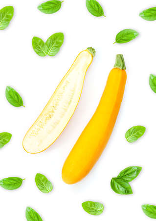 Zucchini isolated. Zucchini basil leaves white background. Set of yellow zucchini. Top viewの写真素材