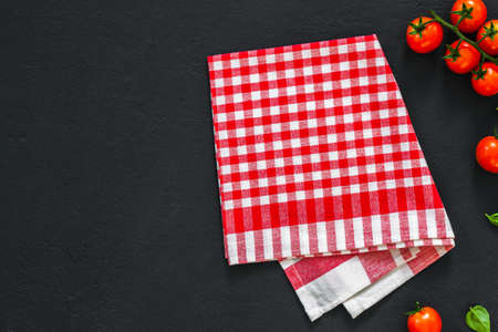 ? lassic italian background made tomato and basil on dark table. View from above, horizontal