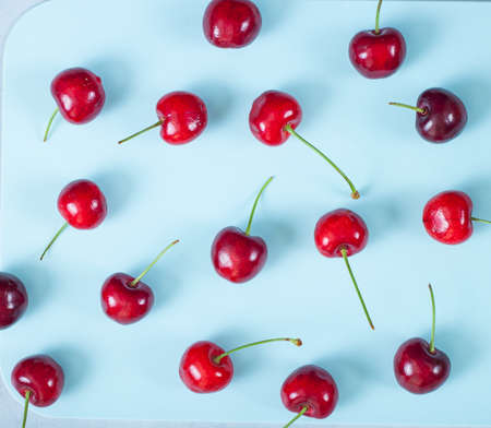 Cherry background. Ripe ripe cherries. Sweet red cherries. Fruit backgroundの写真素材
