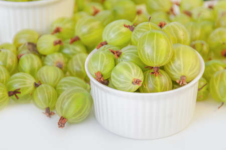 Ripe green gooseberry berry. Green gooseberry isolated on white background