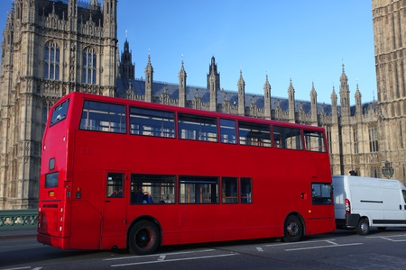 Big Ben with red city bus in London, UK の写真素材