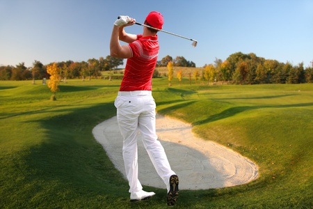 Man playing golfの写真素材