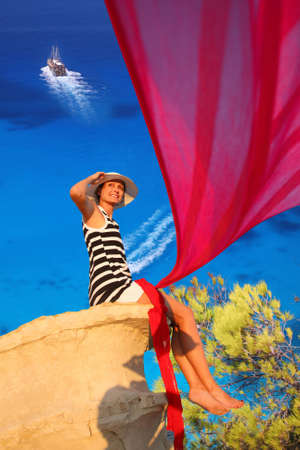 Sexy Woman on the rock above azure sea, Greece, Zakynthos Islandの写真素材