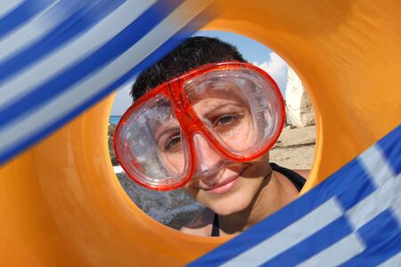 beautiful woman diver with greece flag の写真素材