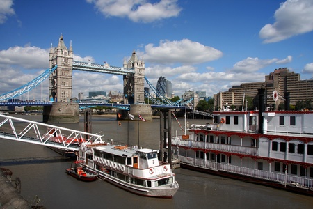 Famous Tower Bridge with city cruise in London, UKの写真素材