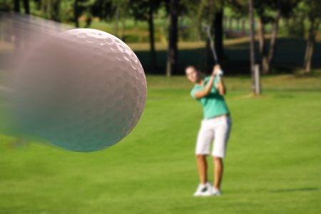 woman playing golfの写真素材