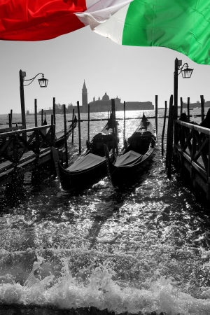 Venice with gondolas on Grand Canal against San Giorgio Maggiore churchの写真素材