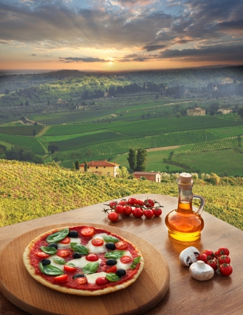 Italian pizza in Chianti, famous vineyard landscape in Italyの写真素材