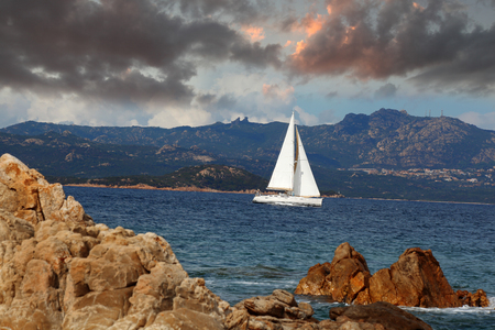 White sailboat in Sardinia, Italyの写真素材