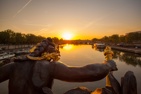 Bridge of Alexander III in Paris against sunset in Franceの写真素材