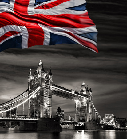 Famous London Tower Bridge with flag of Englandの写真素材