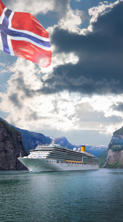 Geiranger fjord with cruise against sunset in Norwayの写真素材