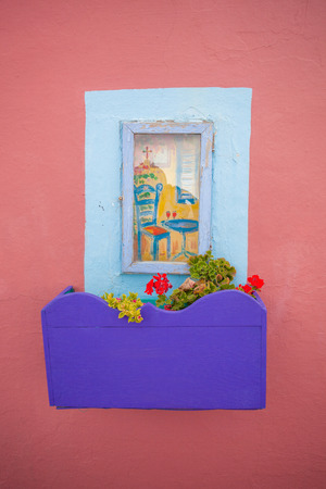 Santorini island with reflection of church in the window, Greeceの写真素材