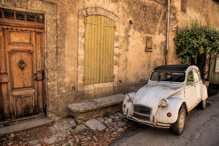 Classic French car on a street in the Provence, Franceの写真素材