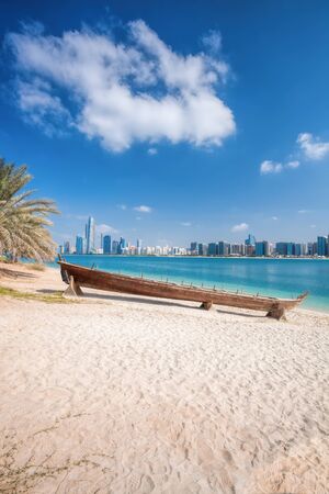City Abu Dhabi with wooden boats in United Arab Emiratesの写真素材