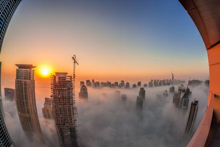 Dubai Marina with colorful sunset in Dubai, United Arab Emirates