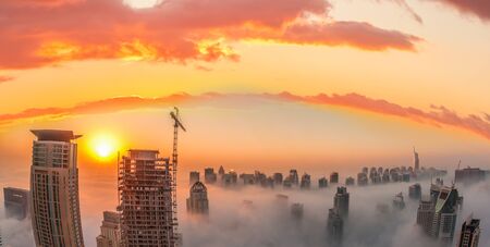 Dubai Marina with colorful sunset in Dubai, United Arab Emiratesの写真素材