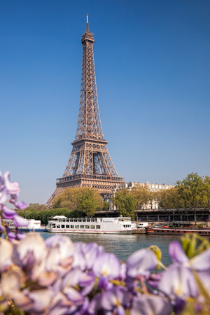Eiffel Tower with boat during spring time in Paris, Franceの写真素材