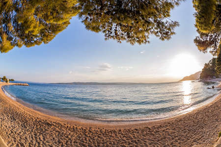 Amazing Croatian beaches against sunset in Brela, Dalmatia, Croatia